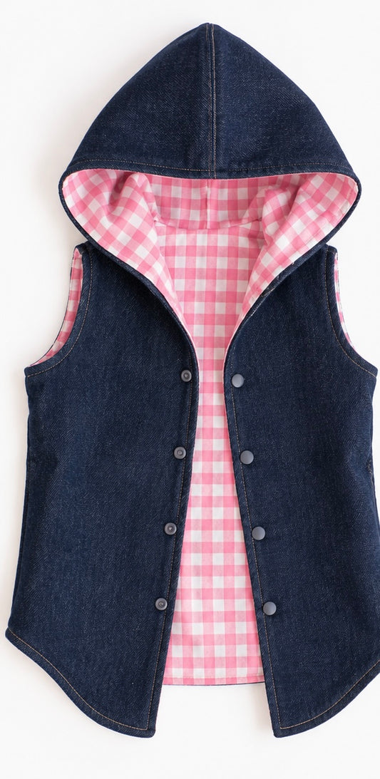 Front view of girls dark indigo denim hooded vest with pink gingham lining and snap closure